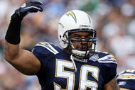 SAN DIEGO - JANUARY 17: Linebacker Shawne Merriman #56 of the San Diego Chargers signals on the field during the AFC Divisional Playoff Game against the New York Jets at Qualcomm Stadium on January 17, 2010 in San Diego, California. (Photo by Donald Miralle/Getty Images)