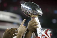 GLENDALE, AZ - FEBRUARY 03:  The New York Giants holds the Vince Lombardi Trophy after defeating the New England Patriots 17 0 14 after Super Bowl XLII on February 3, 2008 at the University of Phoenix Stadium in Glendale, Arizona.  (Photo by Elsa/Getty Images)