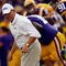 BATON ROUGE, LA - SEPTEMBER 19:  Head Coach Les Miles of the Louisiana State University Tigers runs onto the field during pregame before playing the University of Louisiana-Lafatette Ragin' Cajuns at Tiger Stadium on September 19, 2009 in Baton Rouge, Louisiana.  (Photo by Chris Graythen/Getty Images)
