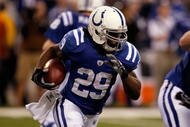 INDIANAPOLIS - JANUARY 24: Running back Joseph Addai #29 of the Indianapolis Colts runs the ball against the New York Jets during the AFC Championship Game at Lucas Oil Stadium on January 24, 2010 in Indianapolis, Indiana. The Colts defeated the Jets 30-17. (Photo by Jonathan Daniel/Getty Images)