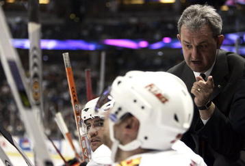 ANAHEIM, CA - APRIL 16: Head Coach and General Manager Darryl Sutter of the Calgary Flames gives orders to the bench against the Anaheim Mighty Ducks during Flames v Ducks NHL Game at the Arrowhead Pond on April 17, 2006 in Anaheim, California.
