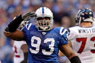 INDIANAPOLIS - NOVEMBER 8:  Dwight Freeney #93 of the Indianapolis Colts celebrates a sack during the NFL game against the Houston Texans at Lucas Oil Stadium on November 8, 2009 in Indianapolis, Indiana. The Colts defeated the Texans 20-17.  (Photo by Andy Lyons/Getty Images)