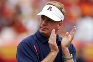 LOS ANGELES - OCTOBER 8: Head Coach Mike Stoops of Arizona cheers on his team at the Los Angeles Colliseum on October 8, 2005 in Los Angeles, California. USC won 42-21. (Photo by Harry How/Getty Images)