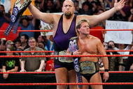 LAS VEGAS - AUGUST 24:  Wrestlers and tag team partners Chris Jericho (L) and Big Show appear in the ring during the WWE Monday Night Raw show at the Thomas & Mack Center August 24, 2009 in Las Vegas, Nevada.  (Photo by Ethan Miller/Getty Images)