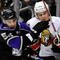 LOS ANGELES, CA - DECEMBER 03:  Filip Kuba #17 of the Ottawa Senators is checked to the boards by Teddy Purcell #54 of the Los Angeles Kings during the second period of the NHL hockey game on December 3, 2009 in Los Angeles, California.  (Photo by Kevork Djansezian/Getty Images)