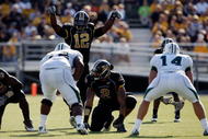 COLUMBIA, MO - NOVEMBER 07:  Linebacker Sean Weatherspoon #12 of the Missouri Tigers directs the defense during the game against the Baylor Bears at Faurot Field/Memorial Stadium on November 7, 2009 in Columbia, Missouri.  (Photo by Jamie Squire/Getty Images)