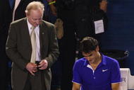 MELBOURNE, AUSTRALIA - FEBRUARY 01: Australian tennis legend Rod Laver consoles Roger Federer of Switzerland after the men's final match against Rafael Nadal of Spain during day fourteen of the 2009 Australian Open at Melbourne Park on February 1, 2009 in Melbourne, Australia. (Photo by Cameron Spencer/Getty Images)