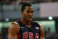SHANGHAI, CHINA - AUGUST 05:  Dwight Howard #11 of the USA Basketball Men's Senior National Team holds a ball during the USA Basketball International Challenge exhibition game against the Australia National Team at the Qizhong Arena on August 5, 2008 in Shanghai, China.  (Photo by MN Chan/Getty Images)
