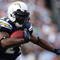 SAN DIEGO - JANUARY 17:  Running back LaDainian Tomlinson #21 of the San Diego Chargers runs with the ball against the New York Jets during the AFC Divisional Playoff Game at Qualcomm Stadium on January 17, 2010 in San Diego, California.  (Photo by Donald Miralle/Getty Images)