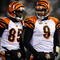 EAST RUTHERFORD, NJ - JANUARY 03:  Quarterback Carson Palmer #9 of the Cincinnati Bengals talks with teammate Chad Ochocinco #85 during the game against the New York Jets at Giants Stadium on January 3, 2010 in East Rutherford, New Jersey.  (Photo by Jeff Zelevansky/Getty Images)