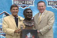 CANTON, OH - AUGUST 3:  Pro Football Hall of Fame inductee Hank Stram (L) poses with his bust and his presenter and fellow Hall of Famer Len Dawson during the 2003 NFL Hall of Fame Induction ceremony on August 3, 2003 in Canton, Ohio.  (Photo by David Maxwell/Getty Images)