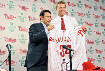 PHILADELPHIA - DECEMBER 16: Pitcher Roy Halladay of the Philadelphia Phillies and senior vice president and general manager Ruben Amaro, Jr. pose for a photograph on December 16, 2009 at Citizens Bank Park in Philadelphia, Pennsylvania. (Photo by Drew Hallowell/Getty Images)