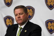 SOUTH BEND, IN - DECEMBER 11: Brian Kelly attends a press conference where he was named new football head coach at Notre Dame University on December 11, 2009 in South Bend, Indiana.  Kelly most recently led the University of Cincinnati to two consecutive Bowl Championship Series appearances including a perfect 12-0 record this past season. (Photo by Frank Polich/Getty Images)