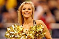 NEW ORLEANS - JANUARY 16: A cheerleader for the New Orleans Saints performs against the Arizona Cardinals during the NFC Divisional Playoff Game at Louisana Superdome on January 16, 2010 in New Orleans, Louisiana. (Photo by Ronald Martinez/Getty Images)