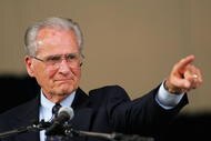 COOPERSTOWN, NY - JULY 31: Jerry Coleman points to his wife in the crowd after receiving the Ford C. Frick Award, presented annually to a baseball broadcaster for major contributions to the game, during the Baseball Hall of Fame induction ceremony on July 31, 2005 at the Clark Sports Complex in Cooperstown, New York. (Photo by Ezra Shaw/Getty Images)