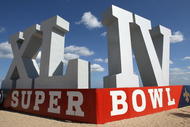 FORT LAUDERDALE, FL - FEBRUARY 6: A giant Super Bowl sign sits on Fort Lauderdale Beach on February 6, 2010 in Fort Lauderdale, Florida. Super Bowl XLIV between the Indianapolis Colts and the New Orleans Saints will be held Sunday February 7, 2010. (Photo by Jed Jacobsohn/Getty Images)