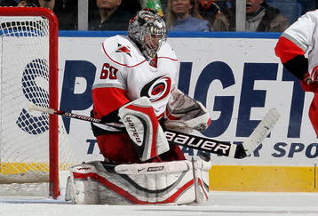 UNIONDALE, NY - FEBRUARY 06:  Justin Peters #60 of the Carolina Hurricanes makes a save against the New York Islanders on February 6, 2010 at Nassau Coliseum in Uniondale, New York.  (Photo by Jim McIsaac/Getty Images)