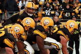 PITTSBURGH - DECEMBER 27:  Ben Roethlisberger #7 of the Pittsburgh Steelers lines up under teammate center Justin Hartwig #62 before the snap during the game against the Baltimore Ravens at Heinz Field on December 27, 2009 in Pittsburgh, Pennsylvania.  (Photo by Karl Walter/Getty Images)