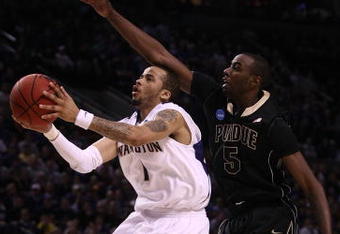PORTLAND, OR - MARCH 21:  Venoy Overton #1 of the Washington Huskies goes up for a shot against Keaton Grant #5 of the Purdue Boilermakers in the first half during the second round of the NCAA Division I Men's Basketball Tournament at the Rose Garden on March 21, 2009 in Portland, Oregon.  (Photo by Jonathan Ferrey/Getty Images)