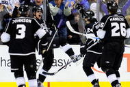 LOS ANGELES, CA - FEBRUARY 04:  Anze Kopitar #11 of the Los Angeles Kings celebrates his power-play goal with teammates against the Anaheim Ducks during the third period of the NHL hockey game on February 4, 2010 in Los Angeles, California. Los Angeles Kings tied a franchise record with their eighth straight victory after defeating the Anaheim Ducks  6-4.  (Photo by Kevork Djansezian/Getty Images)