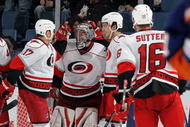 UNIONDALE, NY - FEBRUARY 06:  Justin Peters #60 of the Carolina Hurricanes celebrates his victory against the New York Islanders with teammate Rod Brind'Amour #17 on February 6, 2010 at Nassau Coliseum in Uniondale, New York.  (Photo by Jim McIsaac/Getty Images)