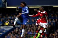 LONDON, ENGLAND - FEBRUARY 07: Didier Drogba of Chelsea and William Gallas of Arsenal battle for the ball during the Barclays Premier League match between Chelsea and Arsenal at Stamford Bridge on February 7, 2010 in London, England. (Photo by Paul Gilham/Getty Images)