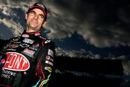 AVONDALE, AZ - NOVEMBER 13:  Jeff Gordon, driver of the #24 DuPont Chevrolet, stands on pit road during qualifying for the NASCAR Sprint Cup Series Checker O'Reilly Auto Parts 500 at Phoenix International Raceway on November 13, 2009 in Avondale, AZ.  (Photo by Jason Smith/Getty Images for NASCAR)