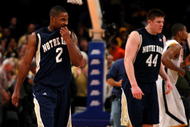 NEW YORK - MARCH 11: Tory Jackson #2 and Luke Harangody #44 of the Notre Dame Fighting Irish react after a game against the West Virginia Mountaineers during the second round of the Big East Tournament at Madison Square Garden on March 11, 2009 in New York City. (Photo by Jim McIsaac/Getty Images)