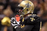 NEW ORLEANS - JANUARY 24:  Scott Fujita #55 of the New Orleans Saints gets set to bow as a gesture after a defensive stop against the Minnesota Vikings during the NFC Championship Game at the Louisiana Superdome on January 24, 2010 in New Orleans, Louisiana. The Saints won 31-28 in overtime. (Photo by Jed Jacobsohn/Getty Images)