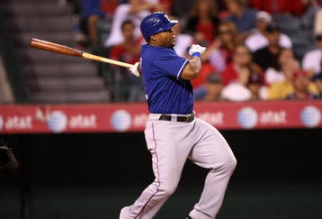 ANAHEIM, CA - JULY 08:  Marlon Byrd #22 of the Texas Rangers bats against the Los Angeles Angels of Anaheim on July 8, 2009 at Angel Stadium in Anaheim, California.  The Rangers won 8-1.  (Photo by Stephen Dunn/Getty Images)