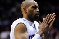ORLANDO, FL - JANUARY 22:  Vince Carter #15 of the Orlando Magic applauds during the game against the Sacramento Kings at Amway Arena on January 22, 2010 in Orlando, Florida. NOTE TO USER: User expressly acknowledges and agrees that, by downloading and/or using this Photograph, user is consenting to the terms and conditions of the Getty Images License Agreement.  (Photo by Sam Greenwood/Getty Images)
