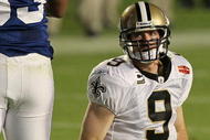 MIAMI GARDENS, FL - FEBRUARY 07: Drew Brees #9 of the New Orleans Saints reacts after being sacked by Dwight Freeney #93 of the Indianapolis Colts during Super Bowl XLIV on February 7, 2010 at Sun Life Stadium in Miami Gardens, Florida. (Photo by Jed Jacobsohn/Getty Images)