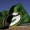 GREEN BAY, WI - OCTOBER 29:  A Green Bay Packers flag is waved during a game against the Arizona Cardinals at Lambeau Field on October 29, 2006 in Green Bay Wisconsin.  The Packers won 31-14.  (Photo by Stephen Dunn/Getty Images)