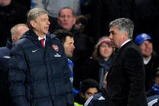 LONDON, ENGLAND - FEBRUARY 07:  Chelsea Manager Carlo Ancelotti (R) and Arsenal Manager Arsene Wenger speak during the Barclays Premier League match between Chelsea and Arsenal at Stamford Bridge on February 7, 2010 in London, England.  (Photo by Mike Hewitt/Getty Images)