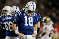MIAMI GARDENS, FL - FEBRUARY 07: Peyton Manning #18 of the Indianapolis Colts reacts after a play against the New Orleans Saints during Super Bowl XLIV on February 7, 2010 at Sun Life Stadium in Miami Gardens, Florida. (Photo by Donald Miralle/Getty Images)