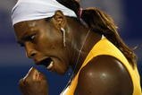 MELBOURNE, AUSTRALIA - JANUARY 30:  Serena Williams of the United States of America celebrates winning a point in her women's final match against Justine Henin of Belgium during day thirteen of the 2010 Australian Open at Melbourne Park on January 30, 2010 in Melbourne, Australia.  (Photo by Clive Brunskill/Getty Images)