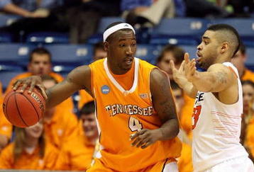 DAYTON, OH - MARCH 20: Wayne Chism #4 of the Tennessee Volunteers handles the ball against Marshall Moses #33 of the Oklahoma State Cowboys during the first round of the NCAA Division I Men's Basketball Tournament at the University of Dayton Arena on March 20, 2009 in Dayton, Ohio.  (Photo by Andy Lyons/Getty Images)