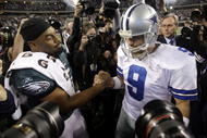 ARLINGTON, TX - JANUARY 9: (R-L) Tony Romo #9 of the Dallas Cowboys shakes hands with Donovan McNabb #5 of the Philadelphia Eagles after the Cowboys 34-14 victory against the Eagles in the 2010 NFC wild-card playoff game at Cowboys Stadium on January 9, 2010 in Arlington, Texas. (Photo by Jamie Squire/Getty Images)