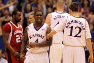 LAWRENCE, KS - FEBRUARY 06:  Sherron Collins #4 of the Kansas Jayhawks reacts after scoring during the game against the Nebraska Cornhuskers on February 6, 2010 at Allen Fieldhouse in Lawrence, Kansas.  (Photo by Jamie Squire/Getty Images)