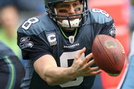 SEATTLE - JANUARY 03:  Quarterback Matt Hasselbeck #8 of the Seattle Seahawks fumbles against the Tennessee Titans on January 3, 2010 at Qwest Field in Seattle, Washington. The Seahawks recovered the ball on the play but were defeated 17-13. (Photo by Otto Greule Jr/Getty Images)