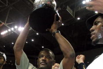 AUBURN HILLS, MI - JUNE 1:  (L-R) Chauncey Billups #1, Rasheed Wallace #30, President of Basketball Operations Joe Dumars (holding trophy) and Ben Wallace #3 of the Detroit Pistons celebrate their win over the Indiana Pacers in Game six of the Eastern Conference Finals during the 2004 NBA Playoffs at The Palace of Auburn Hills on June 1, 2004 in Auburn Hills, Michigan.  The Pistons defeated the Pacers 69-65 and won the 2004 Eastern Conference Championship.  NOTE TO USER: User expressly acknowledges and agrees that, by downloading and/or using this Photograph, user is consenting to the terms and conditions of the Getty Images License Agreement. (Photo by Tom Pidgeon/Getty Images)