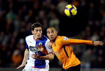 HULL, ENGLAND - DECEMBER 12:  Keith Andrews of Blackburn is challenged by Craig Fagan of Hull during the Barclays Premier League match between Hull City and  Blackburn Rovers at the KC Stadium on December 12, 2009 in Hull, England.  (Photo by Ross Kinnaird/Getty Images)