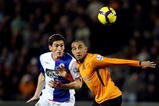 HULL, ENGLAND - DECEMBER 12:  Keith Andrews of Blackburn is challenged by Craig Fagan of Hull during the Barclays Premier League match between Hull City and  Blackburn Rovers at the KC Stadium on December 12, 2009 in Hull, England.  (Photo by Ross Kinnaird/Getty Images)