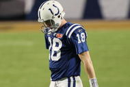 MIAMI GARDENS, FL - FEBRUARY 07:  Peyton Manning #18 of the Indianapolis Colts walks on the field against the New Orleans Saints during Super Bowl XLIV on February 7, 2010 at Sun Life Stadium in Miami Gardens, Florida.  (Photo by Jed Jacobsohn/Getty Images)