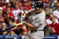 PHILADELPHIA - NOVEMBER 02: Johnny Damon #18 of the New York Yankees hits a broken bat ground out to drive in Eric Hinske in the top of the fifth inning against the Philadelphia Phillies in Game Five of the 2009 MLB World Series at Citizens Bank Park on November 2, 2009 in Philadelphia, Pennsylvania. (Photo by Nick Laham/Getty Images)
