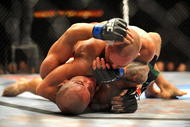 LAS VEGAS - JULY 11: (Top) Georges St. Pierre battles Thiago Alves during their welterweight title bout during UFC 100 on July 11, 2009 in Las Vegas, Nevada. (Photo by Jon Kopaloff/Getty Images)