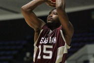 ANAHEIM, CA - NOVEMBER 29: Donald Sloan #15 of Texas A&M shoots the outside jump shot against Minnesota during the 76 Classic at Anaheim Convention Center on November 29, 2009 in Anaheim, California. Texas A&M defeated Minnesota 66-65. (Photo by Victor Decolongon/Getty Images)