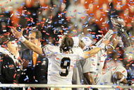 MIAMI GARDENS, FL - FEBRUARY 07:  Drew Brees #9 of the New Orleans Saints celebrates after defeating the Indianapolis Colts during Super Bowl XLIV on February 7, 2010 at Sun Life Stadium in Miami Gardens, Florida.  (Photo by Jed Jacobsohn/Getty Images)