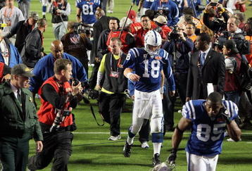 MIAMI GARDENS, FL - FEBRUARY 07:  Peyton Manning #18 of the Indianapolis Colts walks off the field after being defeated by the New Orleans Saints during Super Bowl XLIV on February 7, 2010 at Sun Life Stadium in Miami Gardens, Florida.  (Photo by Jed Jacobsohn/Getty Images)