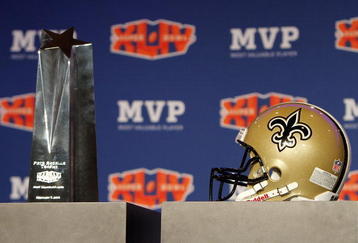FORT LAUDERDALE, FL - FEBRUARY 08:  The Pete Rozelle Trophy for Super Bowl XLIV Most Valuable Player quarterback Drew Brees #9 of the New Orleans Saints sits near the podium before Super Bowl Champion Coach Press Conference at the Fort Lauderdale Convention Center on February 8, 2010 in Fort Lauderdale, Florida.  (Photo by Doug Benc/Getty Images)